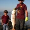 Manrique Ferrerr and 6yr old Josh of Houston landed this 40inch red using mullet-