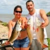 Jason and Ermina Pizano of Houston nightfished to take these large specks and reds on live shrimp-