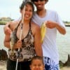 The Hicks family from Houston spent their day catching whiting and croaker.