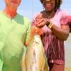 Ted and Madonna Vega of Gilchrist nabbed this nice stringer of specks on live shad.