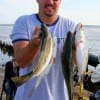 ody Wright of Houston caught many specks with his wife Shannon night fishing with live shrimp.
