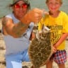 Grandpa Scott Harper took grandson Jaden (7) fishing at rollover where he caught this nice flounder.