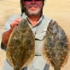 Johnnie Ray of Humble,TX took these flounder on finger mullet.