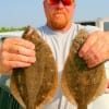 Shane Perrique of Hampshire, TX with 2 flounder caught on finger mullet.