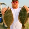 Shane Perrigue of Hampshire, TX took these nice flounder on finger mullet.