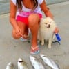 Trout catcher Jasmine Reynolds of Elysian Fields, TX took these four specks in about as many minutes on Lil'Fishys.