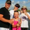 The Cowsert family of Deer Park, TX gives thumbsup to 9yr old Ashely's first fish on her first fishing trip.