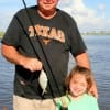 Grandpa Jim Dennard with granddaughter 6yr old Natalie and her very first fish