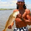 Earl Sosa of Gilchrist nabbed this nice red on finger mullet.