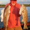 Sid Ingles of Gilchrist took these two big reds on miss nancys finger mullet.