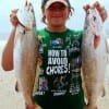Troutmaster JR Noah Bain took these two 24inch trout on mirror lures.
