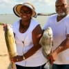 Mr and Mrs Lee of Houston took this drum and red on finger mullet.