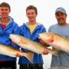 IMG_8355- They're back- the Husk family of Beaumont shows how it's done with these 41- 38- and 31inch bull reds caught on cut bait-