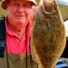 Bay wader Stan McCorguodale of Amarillo, TX drove all the way to rollover to nab this keeper flounder on Berkley Gulp.