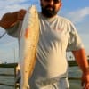 Marcos Lopez of Houston caught this 27 inch red fishing cut mullet.