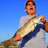 OUCH!! Snapped Cathy Natel of Pineland,TX after being bit by this redfish she caught on shrimp.