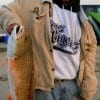 Bonifacio Jimenez of Channel View, TX took this 34inch tagger red on cut mullet.