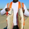 Ray Dillard of Houston  took these 2 reds on live shrimp.