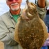 Charles Martin of Crystal Beach, TX nabbed this nice flat fish on finger mullet.