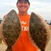 Mike Villareal of Port Neche,s TX landed these two nice flounder on Berkley Gulp.