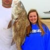 Father and daughter, James and Kaylah Thompson of New Braunfells TX, caught and released this  33inch drum.