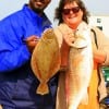 Work buds, Dee Yawn  and TJ Penn took this red and flounder on mud minnows.