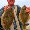 Felix Barker of  Kountze, TX plucked 2 nice flounder from the pass on finger mullet.