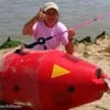 Christy Fregia of  Houston hooked this US Coast Guard bouy on a American Rodsmith Rod.