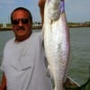 Don Kernan of Port  Bolivar hefts this 6lb speck then released her.-