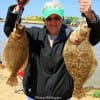 Raywood, TX angler Lola Fregia fished miss nancy mud minnows for this 21inch and 19inch flounder.