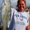 Viginia Strempel of  Channellview, Tx hefts this 6lb speck caught on plastic.