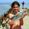 McKenzie Leleaux of Winnie, TX hefts this nice speck shae caught on a soft plastic.