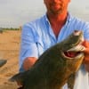 Michael White of Dayton, TX was fishing cut bait when he caught and released this rare Triple Tail.