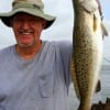 C.T. Nelms of New Caney, TX hefts this nice speck caught on soft plastic.