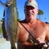 Vidor, TX wade-angler Lynn Sturm fished the early surf for this nice speckled trout.