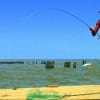 Henri Fontenot of Dallas flps in the final speck  for his 10 trout limit.