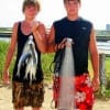 Baitcatchers, Jerisam and Dakota cast netted the surf for Daddys shark fishing adventure.