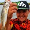 9 yr old Kannon Garcia of League City had fun catching sand perch here at the pass