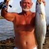 Frank Bunyard of Tarkington Prairie TX hefts this 25 inch-5 lb speck caught on a T-28