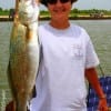 Pat Bunyard of Tarkington Prairie TX hefts this 28 inch-8.3 lb Gator Speck caught on a T-28