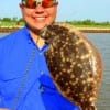 This angler fished the bay side of rollover pass with a live finger mullet to catch this nice flounder