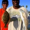 Calvin and Ruth Smith of Houston teamed up to catch this nice flounder and red on shrimp