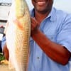 Charles Brown of Missouri City took this nice slot red on a finger mullet