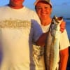Davis and Millissa Newcomb of Hempstead TX hefts this 28 inch gator-speck caught on a Rat-L-Trap