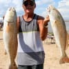 Double Trouble for Henri Fontenot of Dallas with these two slot reds caught on finger mullet