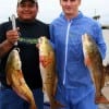 Fishin Buds- Jose Cruze and Joe McClane of Houston nabbed these nice slot reds on finger mullet