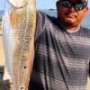 Gelber Perez of Jacksonville TX took this slot red on a finger mullet