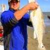 Greg Culver of Pearland TX caught this 30 inch tagger bull red on a finger mullet-his very first red ever
