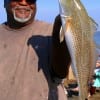 James McBrian of Houston put this nice 23inch slot red in the box fishing shrimp