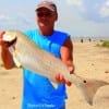 Jimmy Richard (Cajun) of Bridge City TX caught and released this 33 inch tagger bull red on finger mullet